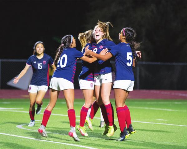 Soccer rallies to win in overtime